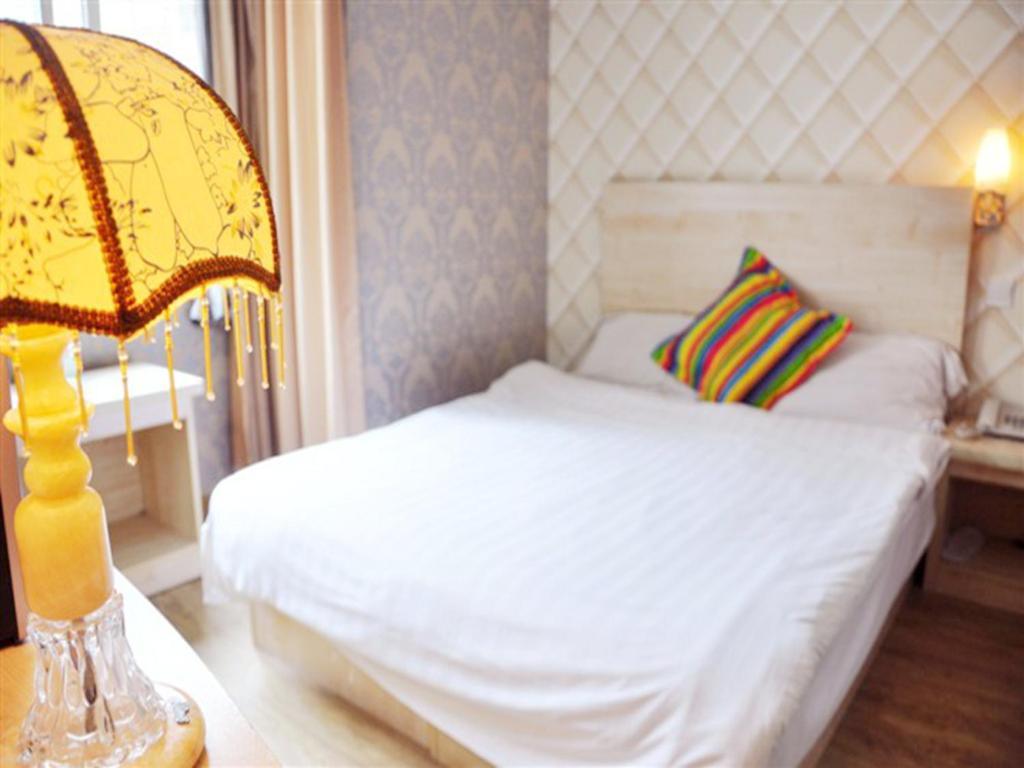 Qingdao Four Seasons Sunshine Business Hotel Chambre photo